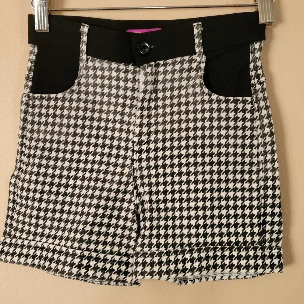 Black and white stretching shorts.